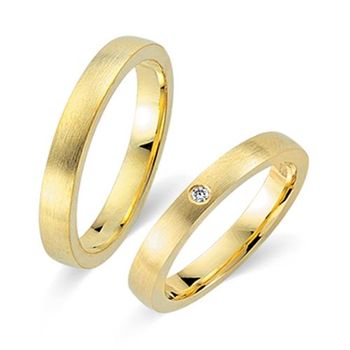 Alianzas oro amarillo 18 quilates con diamante