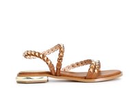 sandalias asimetricas con tachuelas talladas tan