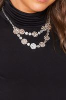 collar plateado con discos golpeados