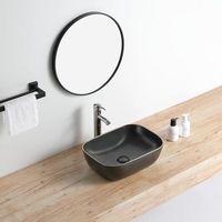 lavabo negro mate borde dorado sobre encimera ceramico cuarto 455 x 325 cm  455 x 325 cm