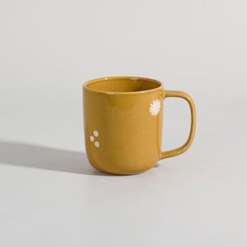 Taza de cerámica amarillo ocre