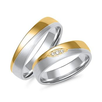Alianzas de oro blanco y amarillo con 3 diamantes