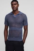 polo de punto regular con botones en el cuello azul
