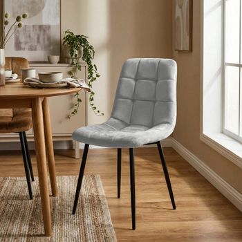 Silla con patas de metal y asiento en terciopelo gris