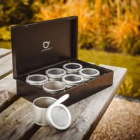 estuche de te negro con 6 cajas de te y cuchara  negro
