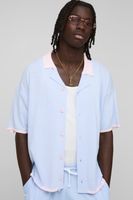 camisa de punto con bordado de palmeras azul
