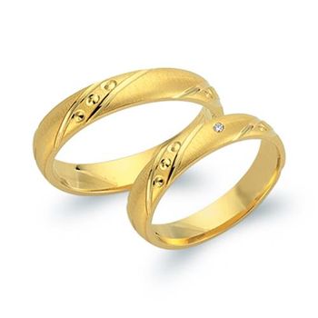 Alianzas 18 quilates oro amarillo con diamante