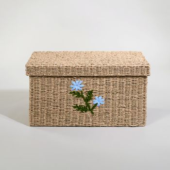 Baúl de almacenaje de jacinto de agua trenzado con flores