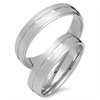 alianzas 8 quilates oro blanco con diamante