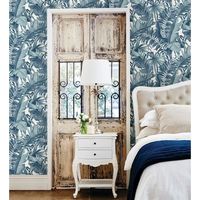 papel pintado vinilico ecologico tropical de hojas de palmera y platanero azul - palm beach 680752 de gaulan - rollo de 10 m x 053 m