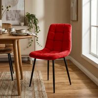 silla con patas de metal y asiento en terciopelo rojo