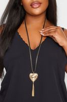 collar largo negro y dorado con corazon