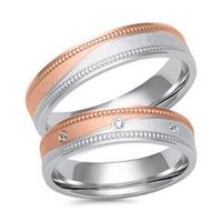alianzas de oro blanco y rosa con 3 diamantes