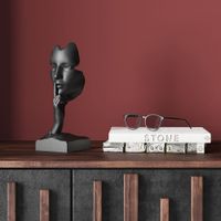 deco estatua cara negra silenciosa