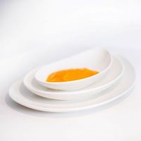 juego de platos de porcelana blanca 18 piezas ovum diseno moderno