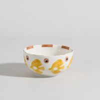 bol de gres blanco y amarillo con pajaros