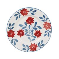 plato de postre de ceramica blanca con flores azules y rojas