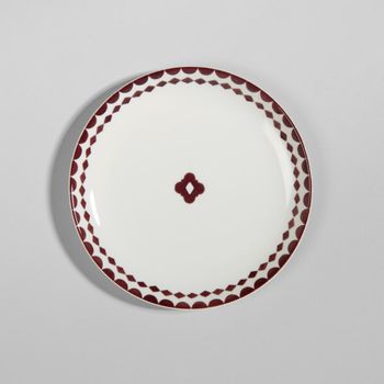 Plato de postre de cerámica blanca con motivos
