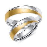 alianzas de oro amarillo y blanco con 3 diamantes