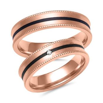 Alianzas de oro rosa y carbono con diamante