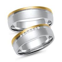 alianzas en oro blanco y amarillo con 7 diamantes