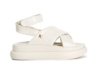 sandalias cruzadas de piel con complemento bone