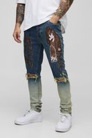 vaqueros pitillo rotos con apliques azul