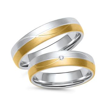 Alianzas de oro amarillo y blanco con diamante