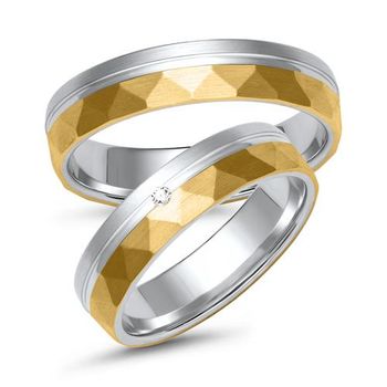 Alianzas de oro blanco y amarillo con diamante