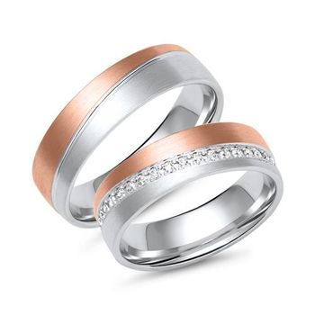Alianzas en oro blanco y rosa con 38 diamantes
