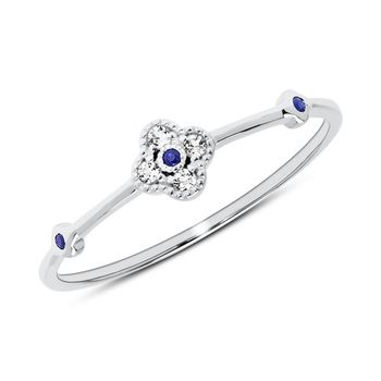 Anillo de oro blanco de 14 quilates con zafiros y topacios blancos
