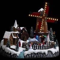 plaza del pueblo iluminada con un molino musical de 59 led