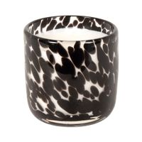 vela en recipiente de vidrio negro moteado