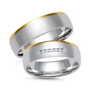 Alianzas de oro blanco y amarillo con 7 diamantes