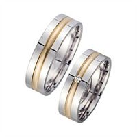 alianzas oro amarillo y blanco con diamante ancho 6 mm