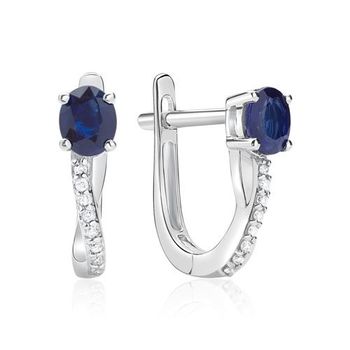 De aros 14 quilates oro blanco 16 diamantes y zafiro