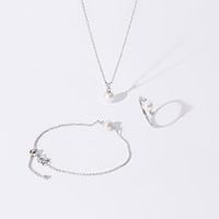conjunto de collar pulsera y anillo de plata de ley