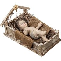 figura nino jesus en pesebre beige y marron