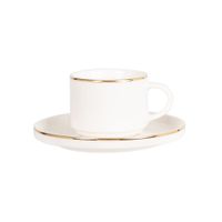 taza de cafe y platillo de porcelana blanca y dorada