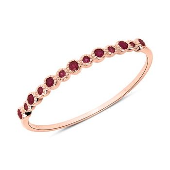 Anillo de oro rosa 14 quilates con rubíes