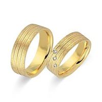 alianzas 8 quilates oro amarillo 3 diamantes