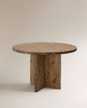 Mesa de comedor redonda de madera maciza en tono envejecido ø110x75cm