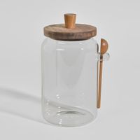 bote de vidrio con tapa y cuchara de madera de acacia
