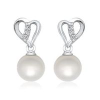 14 quilates pendientes oro blanco perla 6 diamantes