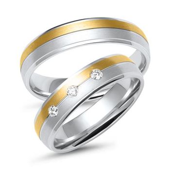 Alianzas de oro blanco y amarillo con 3 diamantes