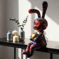 escultura de resina multicolor con forma de conejo 8x10x23 cm