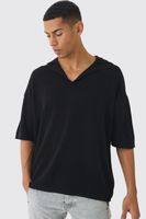 polo oversize de punto con caida en los hombros negro