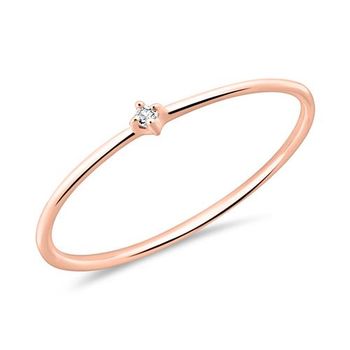 Anillo de mujer en oro rosa de 14 quilates con topacio blanco