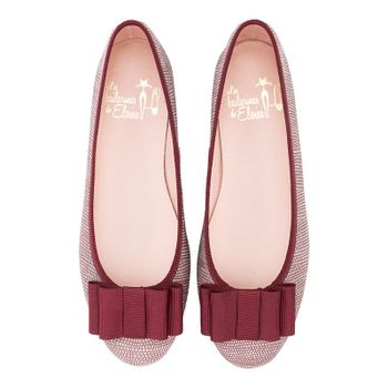 Bailarina plana en ante rosa apagados con lazo zapatero burdeos.