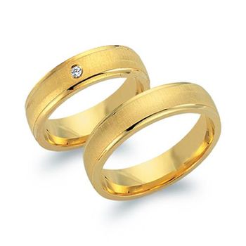 Alianzas oro amarillo 18 quilates con diamante